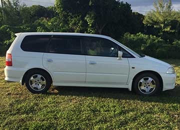 White Honda 7 Seat Minivan Rental